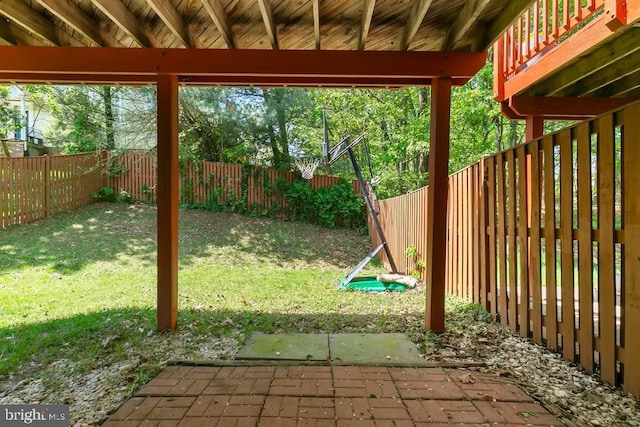 view of yard featuring a fenced backyard and a patio area