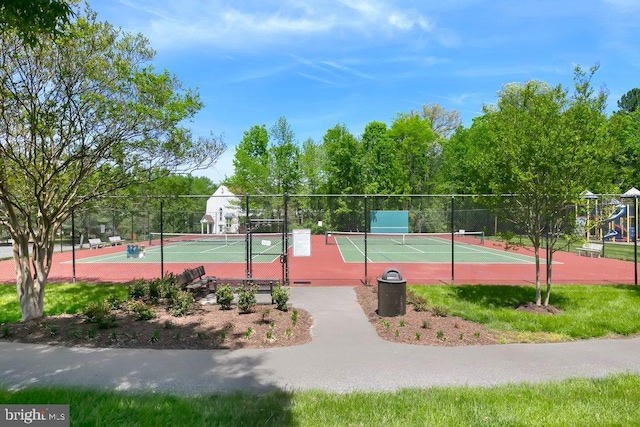 view of sport court with fence