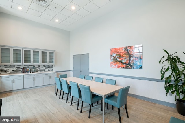 901 N Penn St Unit F706, Philadelphia, PA 19123 - dining space with recessed lighting, a high ceiling, visible vents, and light wood-type flooring