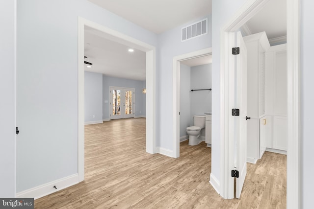 W Main Blvd, Lutherville Timonium, MD 21093 - corridor featuring visible vents, baseboards, recessed lighting, light wood-type flooring, and french doors