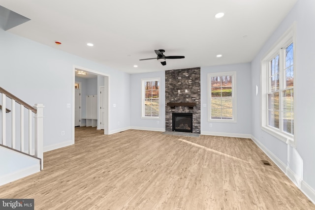 W Main Blvd, Lutherville Timonium, MD 21093 - unfurnished living room featuring visible vents, light wood-style floors, stairway, recessed lighting, and a ceiling fan