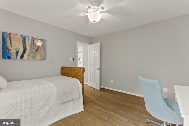 bedroom with baseboards, a ceiling fan, and wood finished floors