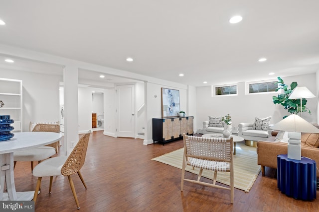 living room with recessed lighting and wood finished floors