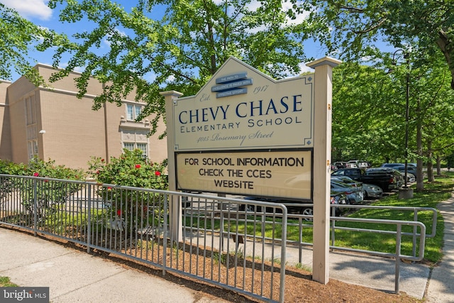 community sign with fence