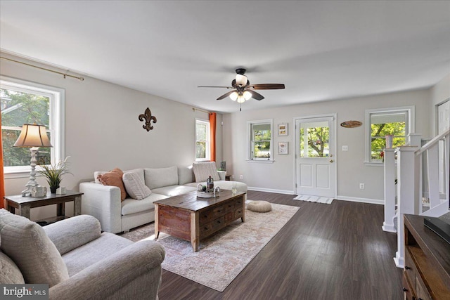26101 Frederick Rd, Clarksburg, MD 20871 - living room featuring stairs, a ceiling fan, dark wood-style floors, and plenty of natural light