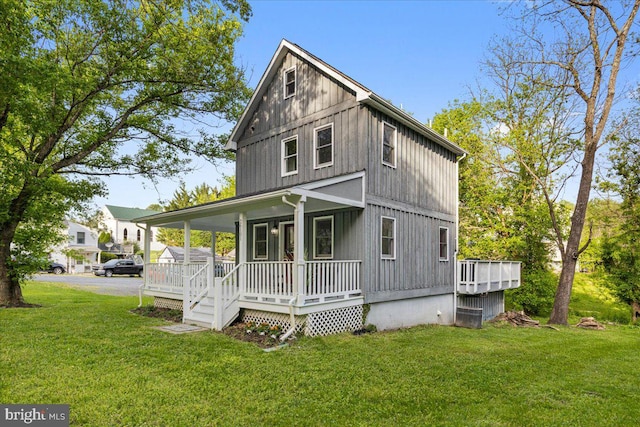 26101 Frederick Rd, Clarksburg, MD 20871 - view of front facade with covered porch and a front yard