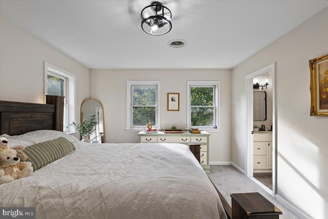 26101 Frederick Rd, Clarksburg, MD 20871 - bedroom featuring light colored carpet, visible vents, a sink, baseboards, and connected bathroom