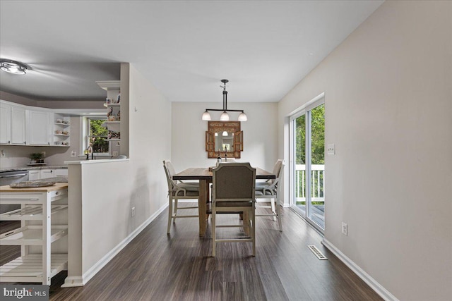 26101 Frederick Rd, Clarksburg, MD 20871 - dining room with visible vents, dark wood finished floors, and baseboards