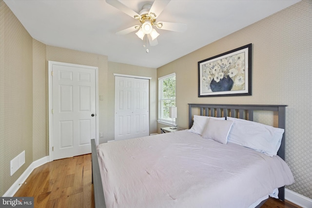 11 Weaver Dr, Evesham, NJ 08053 - bedroom featuring wood finished floors, wallpapered walls, baseboards, a closet, and ceiling fan