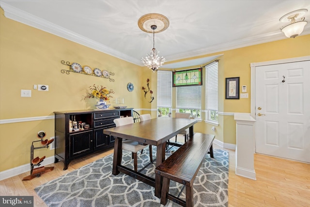 11 Weaver Dr, Evesham, NJ 08053 - dining room featuring crown molding, light wood-style floors, a chandelier, and baseboards