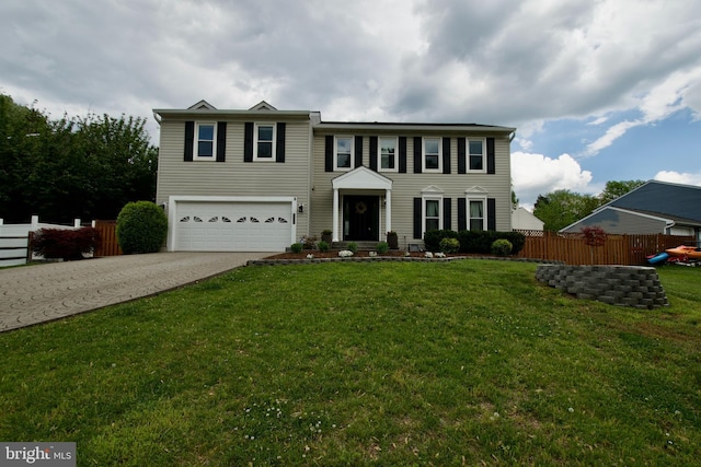 10505 Manor View Pl, Manassas, VA 20110 - view of front of property with fence, an attached garage, concrete driveway, and a front lawn