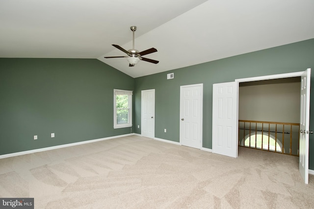 10505 Manor View Pl, Manassas, VA 20110 - unfurnished bedroom featuring visible vents, multiple closets, lofted ceiling, baseboards, and carpet