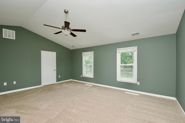 10505 Manor View Pl, Manassas, VA 20110 - spare room featuring baseboards, ceiling fan, vaulted ceiling, and visible vents