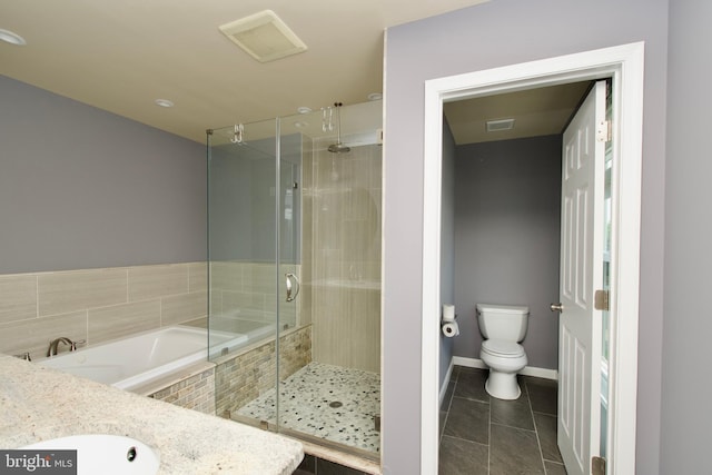 10505 Manor View Pl, Manassas, VA 20110 - bathroom featuring visible vents, tile patterned flooring, a stall shower, baseboards, and toilet