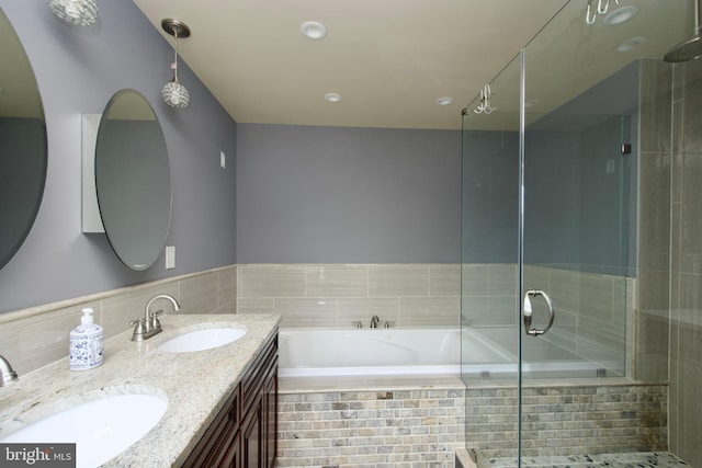 10505 Manor View Pl, Manassas, VA 20110 - full bathroom with a sink, a bath, and a stall shower