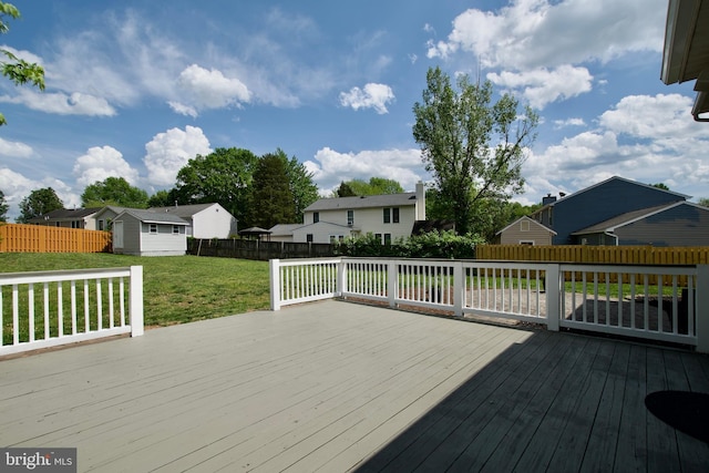 10505 Manor View Pl, Manassas, VA 20110 - wooden terrace with a lawn, an outbuilding, a residential view, a fenced backyard, and a storage unit