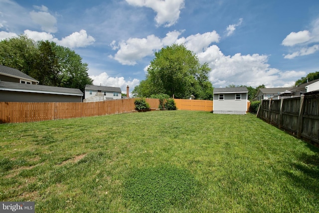 10505 Manor View Pl, Manassas, VA 20110 - view of yard featuring an outdoor structure and a fenced backyard