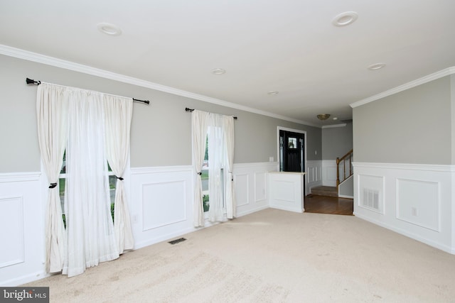 10505 Manor View Pl, Manassas, VA 20110 - carpeted spare room with ornamental molding, wainscoting, stairs, and visible vents