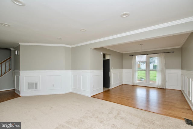 10505 Manor View Pl, Manassas, VA 20110 - carpeted spare room featuring visible vents, wainscoting, and ornamental molding