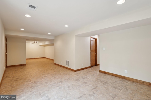 finished below grade area featuring recessed lighting, baseboards, and visible vents