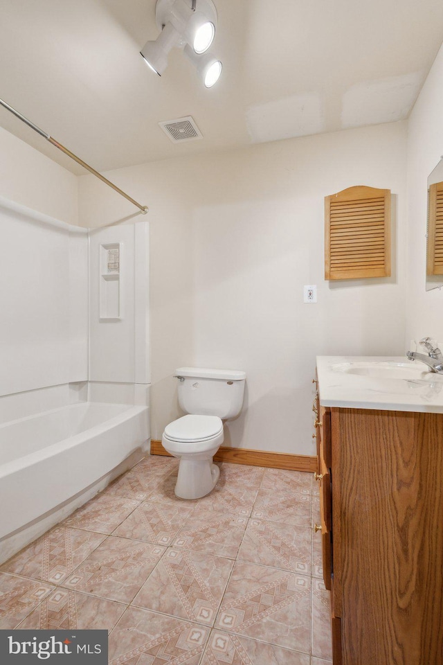 full bathroom with visible vents, baseboards, vanity, toilet, and bathing tub / shower combination