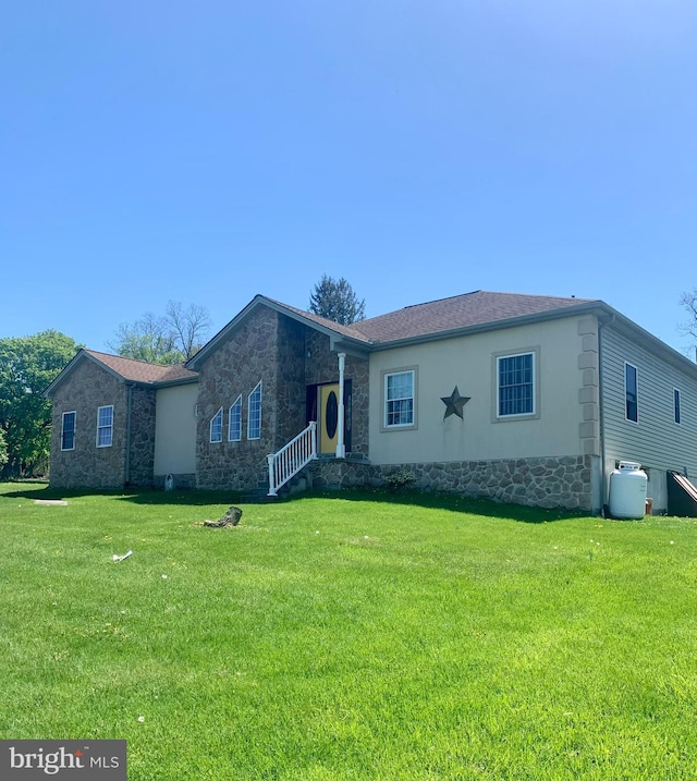 2038 E Harrisburg Pike, Middletown, PA 17057 - single story home with stone siding and a front lawn