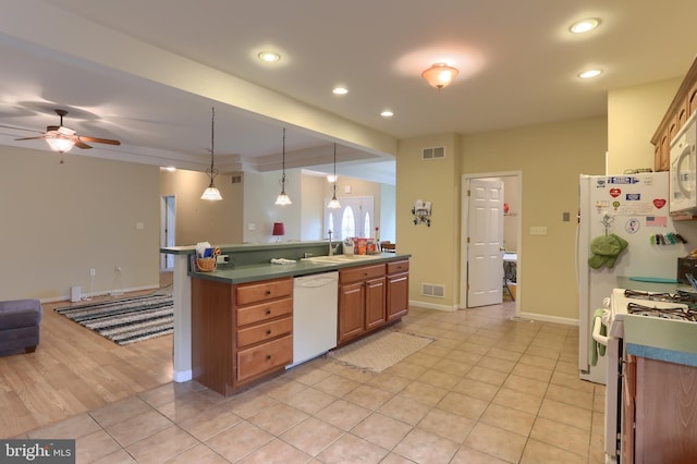 2038 E Harrisburg Pike, Middletown, PA 17057 - kitchen featuring white appliances, open floor plan, visible vents, and a sink