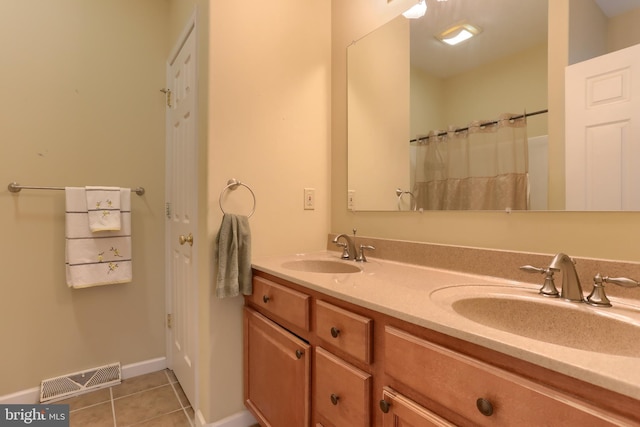 2038 E Harrisburg Pike, Middletown, PA 17057 - full bathroom with a sink, double vanity, visible vents, and tile patterned floors
