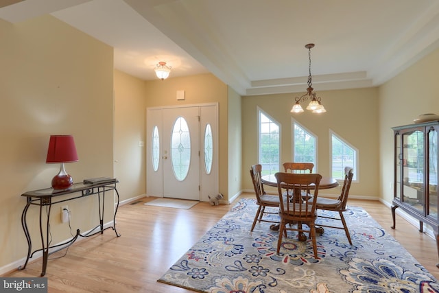 2038 E Harrisburg Pike, Middletown, PA 17057 - entrance foyer featuring an inviting chandelier, light wood-style flooring, baseboards, and a healthy amount of sunlight