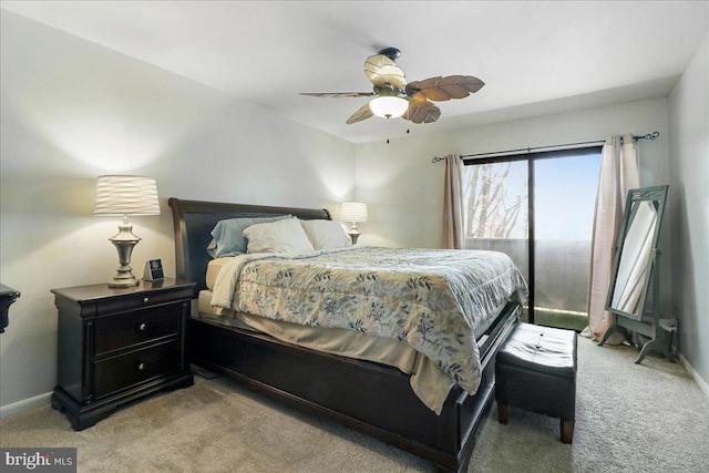 bedroom with baseboards, light carpet, and a ceiling fan
