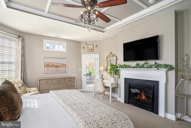 bedroom with visible vents, access to exterior, carpet, and a glass covered fireplace