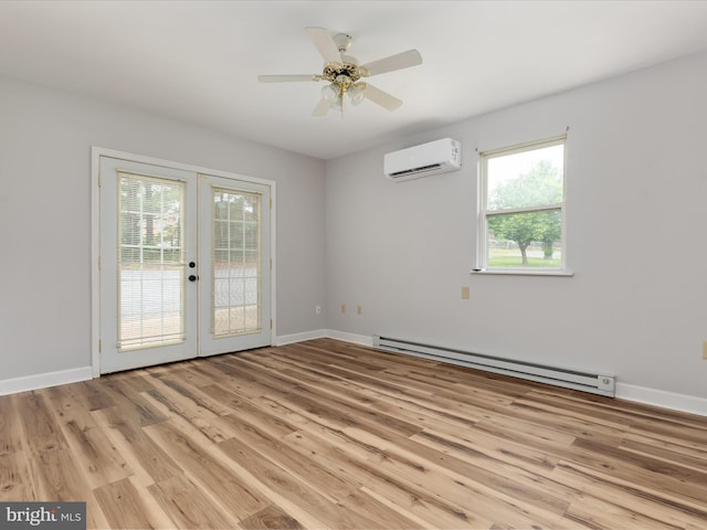 13970 Back Rd, Strasburg, VA 22657 - empty room with a wall mounted air conditioner, a baseboard radiator, french doors, light wood finished floors, and baseboards