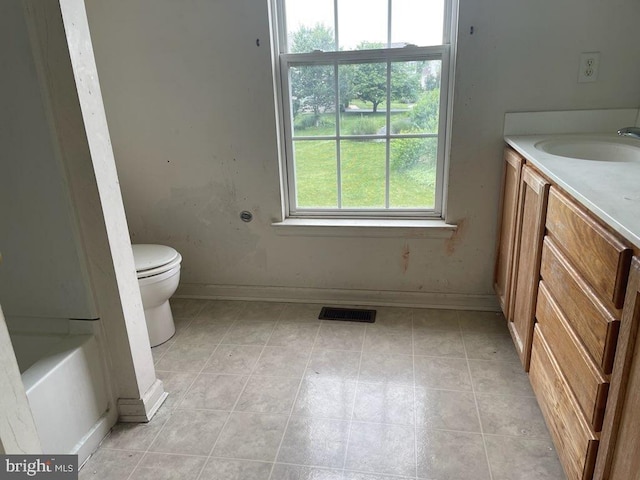 40 Browning Cir, Middletown, DE 19709 - bathroom featuring vanity, a tub, and tile patterned floors