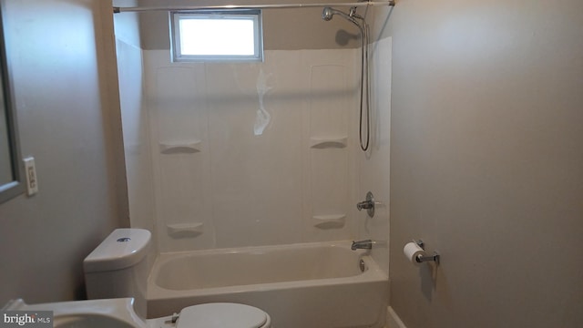 full bathroom featuring toilet and shower / bathing tub combination