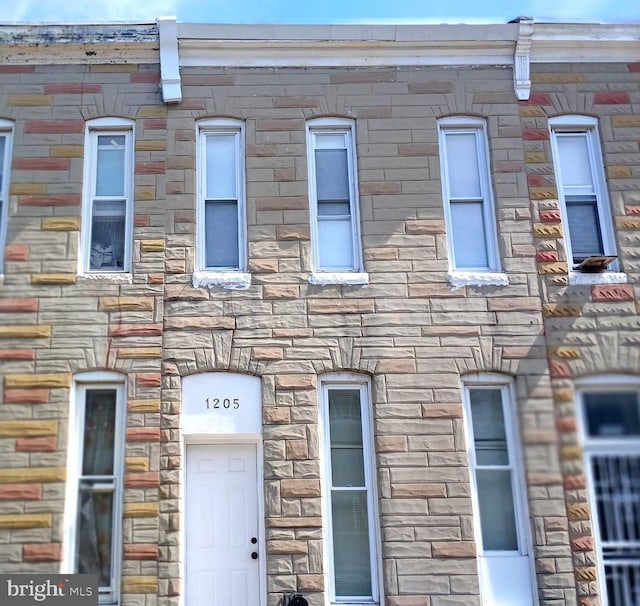 view of front of property featuring stone siding