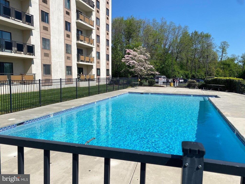 pool featuring fence