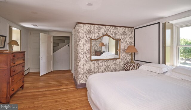 4273 Durham Rd, Kintnersville, PA 18930 - bedroom featuring light wood-style floors, a baseboard radiator, and visible vents