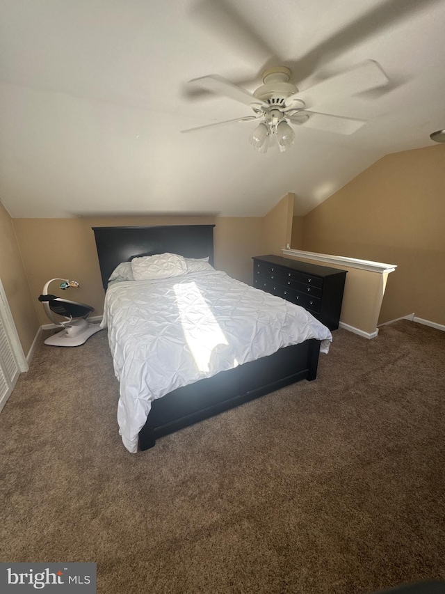 bedroom with carpet floors, baseboards, a ceiling fan, and vaulted ceiling