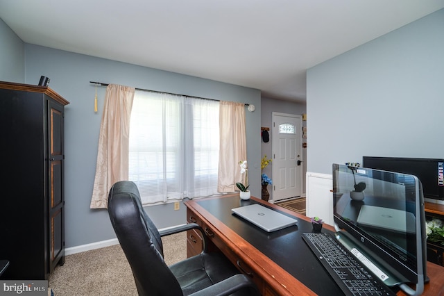 office with carpet floors and baseboards