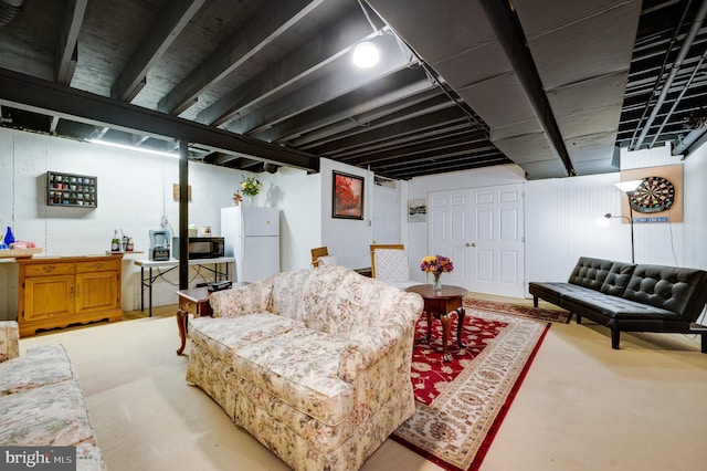 living room featuring finished concrete floors