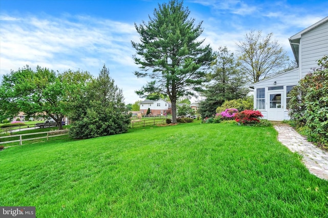 view of yard with fence