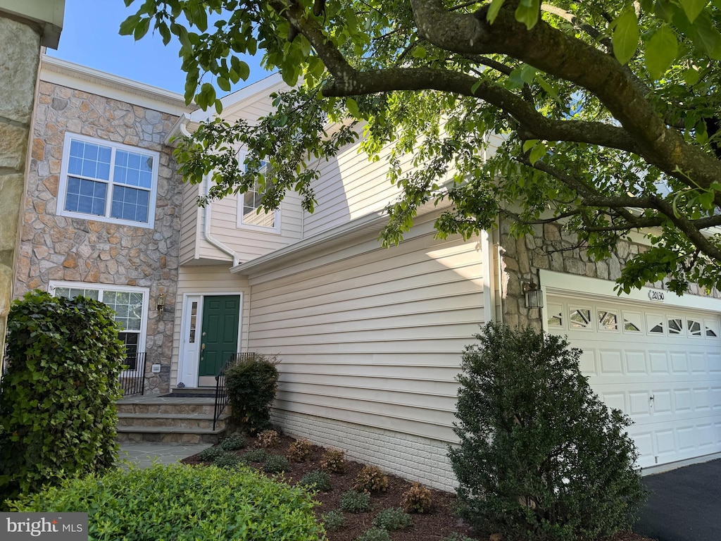 view of front of house featuring stone siding