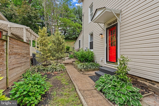 property entrance with fence