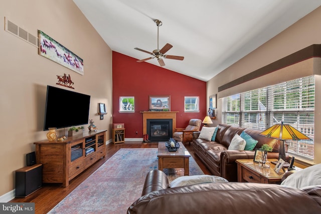 36 Crimson King Dr, Bear, DE 19701 - living room with ceiling fan, baseboards, a fireplace with flush hearth, wood finished floors, and visible vents