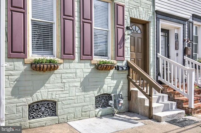 615 1st St, Lancaster, PA 17603 - doorway to property featuring stone siding