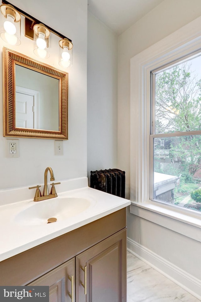 615 1st St, Lancaster, PA 17603 - bathroom with vanity, baseboards, and marble finish floor