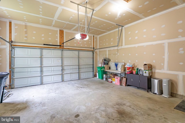garage featuring a garage door opener