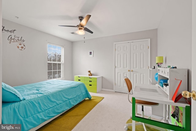 bedroom with carpet floors, a ceiling fan, visible vents, and a closet
