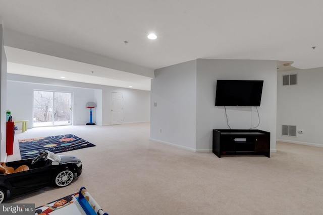exercise area featuring carpet floors, baseboards, recessed lighting, and visible vents