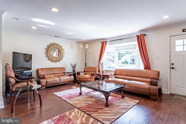 living room featuring crown molding, wood-type flooring, recessed lighting, and visible vents